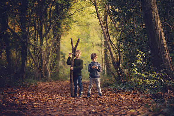 Brothers in the autumn woodland