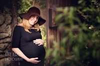 Pregnant bump in black dress