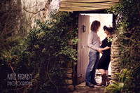 Expecting couple in doorway